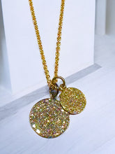 Double diamond disc pendant, "I get by with a little help from my friends"