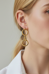 Three ring snake earrings