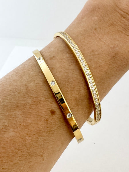 Diamond station gold bangle bracelet