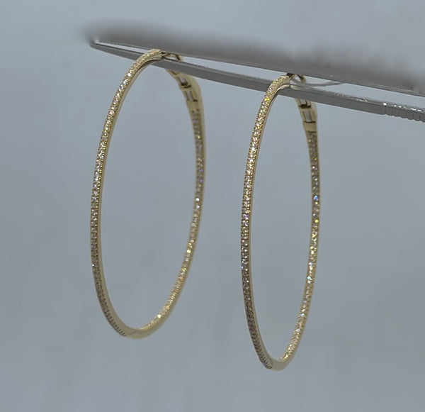 Large “skinny" diamond hoop earrings