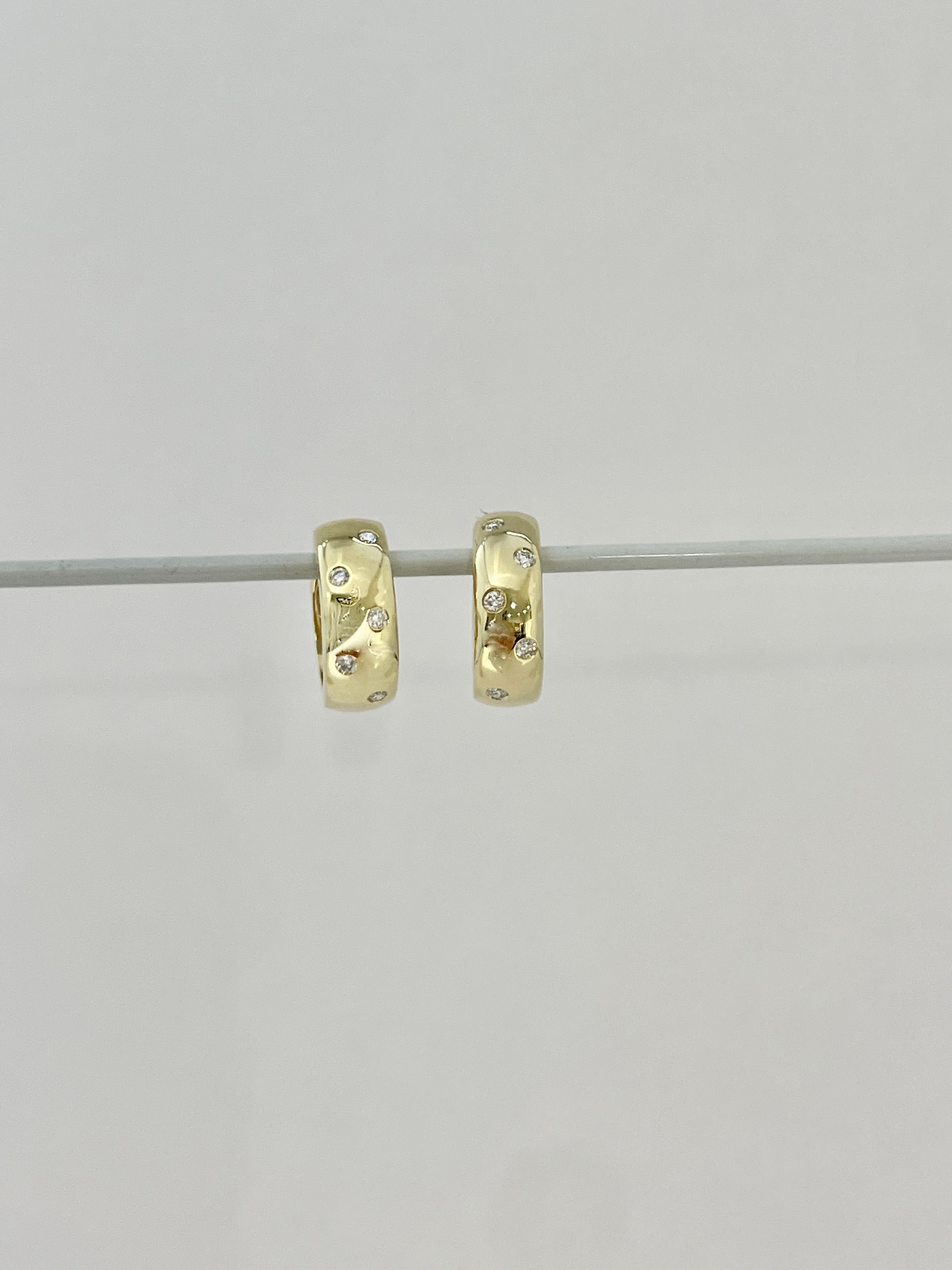 18k diamond huggy hoop earring