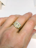 Emerald cut diamond and teardrop ring