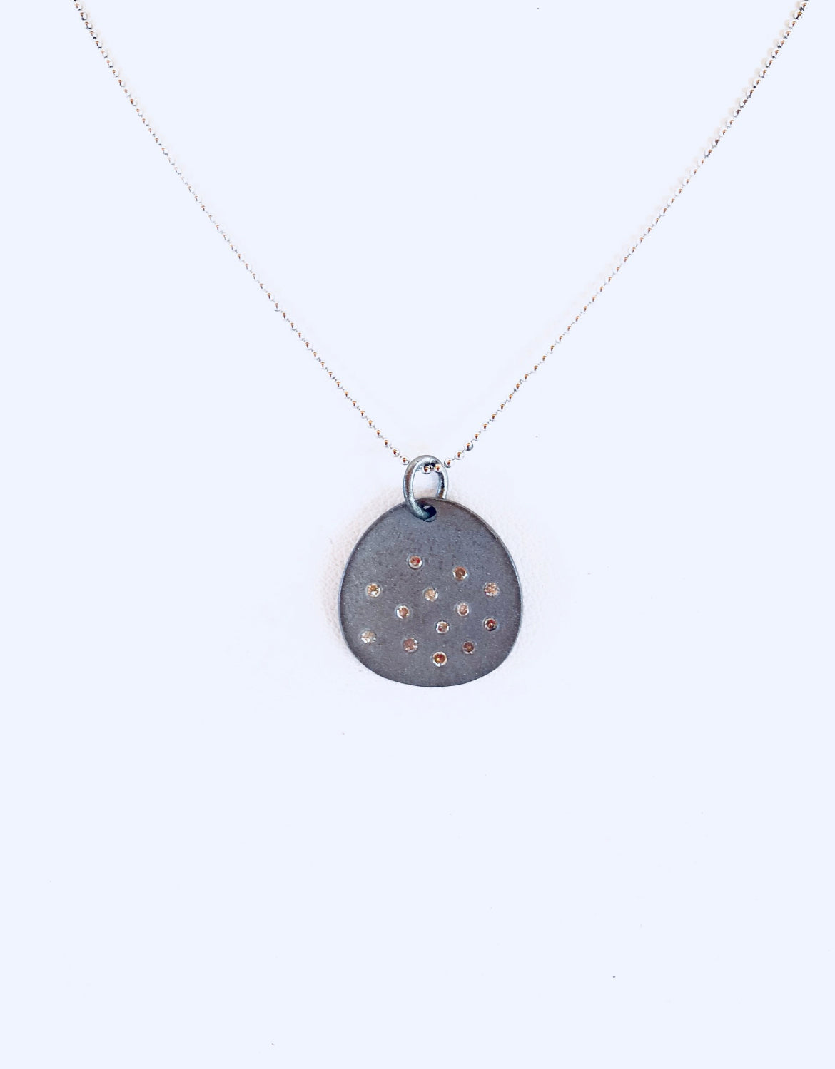 Shield🌟 in sterling with scattered diamonds